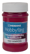Vinröd flaska med etikett: "Herdins Hobbyfärg, Vattenburen hobbyfärg för inomhusbruk, 103 VINRÖD".