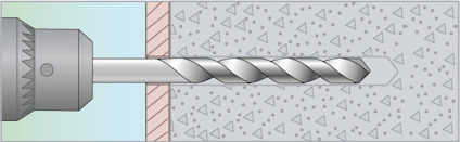 Borr som borrar in i betongvägg.