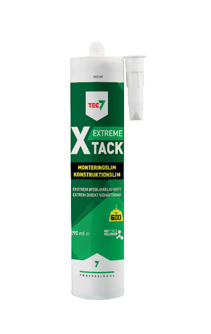Konstruktionslim X-Tack7 vit tub med gröna och vita etiketter, text och logotyp synliga.