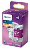 Förpackning av en Philips LED-spotlampa i lila kartong med text "Warm white 2700K", symbol för dimbarhet och energiklass A+.