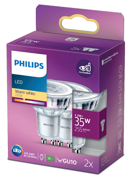 Förpackning med två LED-spotlampor av märket Philips. Text på förpackningen: "Warm white 2700K", "3.5W = 35W", "255 lumen", "GU10".