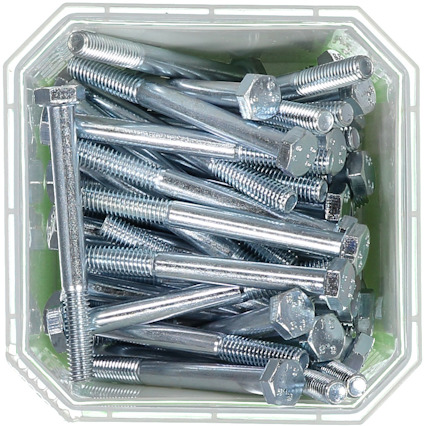 Låda med metallbultar med hexagonala huvuden, staplade i varierande riktningar.