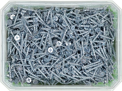 Rektangulär behållare fylld med många silverfärgade skruvar med stjärnskårade huvuden.